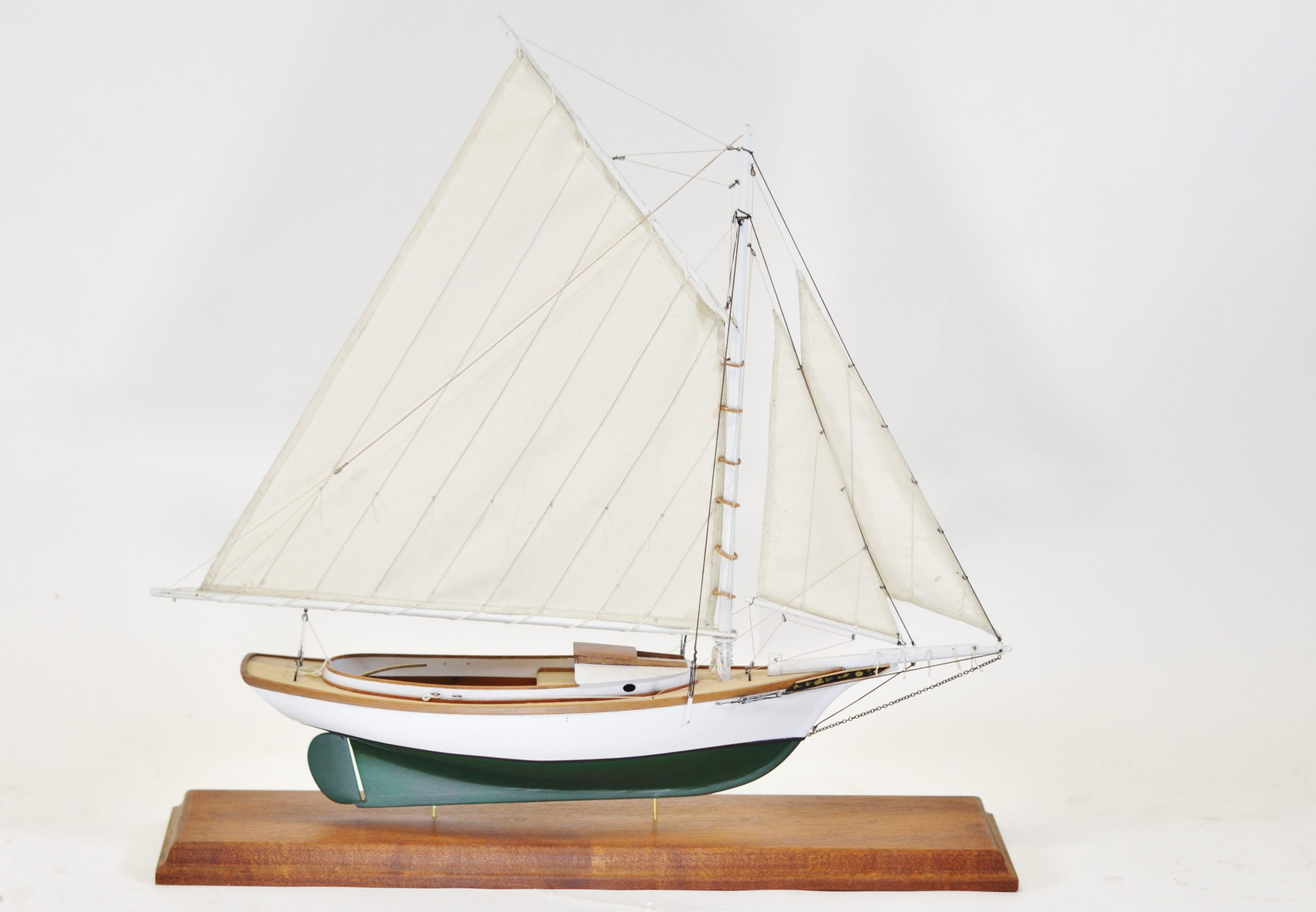 Friendship Sloop | The winning combination of seaworthiness, sail power, and elegant lines was developed in a type of sloop built in Friendship, Maine. Originally used to fish offshore on the Georges Banks, these classics have found popularity as small yachts. Our Friendship sloops are based on a typical 1900 design, and are available in two sizes. Both kits are plank on bulkhead and contain many laser cut parts. These models can be easily detailed and personalized. Remember, in modeling, bigger is usually easier. It is important to note that some pictured items may have been built with optional items not included as part of standard kits, such as pedestals, bases, cases, paint, etc. If there are any questions about the contents of a particular kit, please contact Bluejacket. LOA: 31″ Scale: 1″